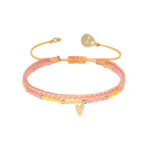 Braided bracelet with a playful gold plated heart charm